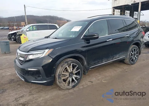 2021 Honda Pilot Awd Touring 8 Passenger z USA, uszkodzony, nr VIN 5FNYF6H91MB077927